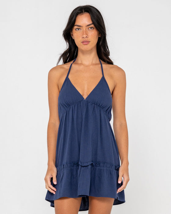 woman-wearing-sienna-mini-dress-in-navy