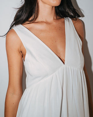 Woman wearing Sara Mini Dress in White