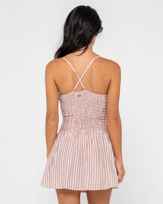 woman-wearing-mimi-smocked-stripe-mini-dress-in-pink-stripe