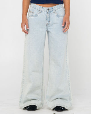 Woman wearing Wendy Wide Low Rise Denim Jean in Sky Blue Heather