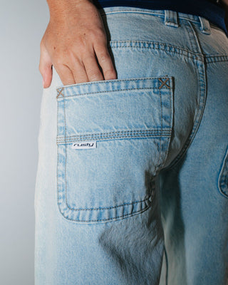 Woman wearing Wendy Wide Low Rise Denim Jean in Sky Blue Heather