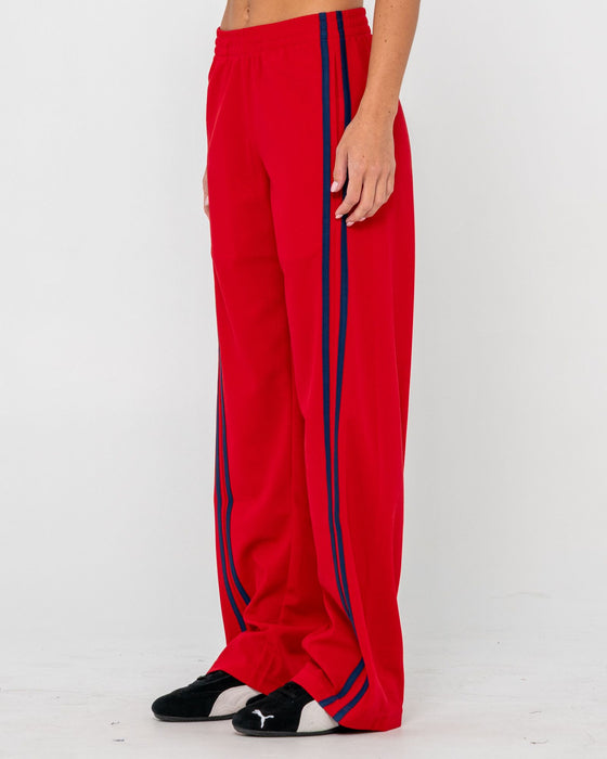 woman-wearing-bronson-low-rise-trackpant-in-red