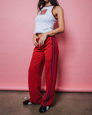 Woman wearing Bronson Low Rise Trackpant in Red