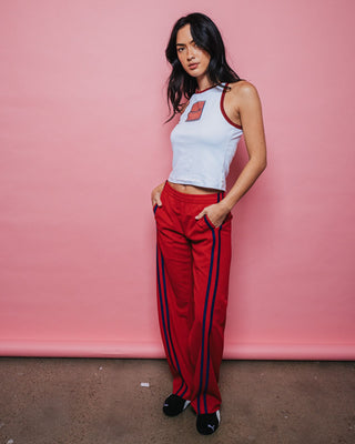 Woman wearing Bronson Low Rise Trackpant in Red