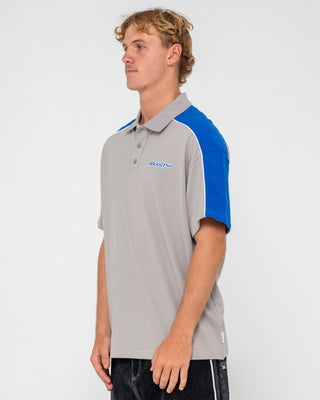 Man wearing Straight Shooter Short Sleeve Polo in Ultimate Grey