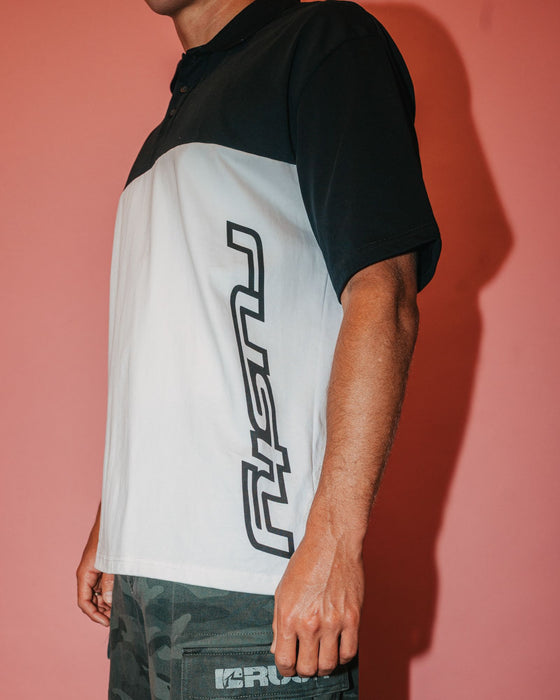 man-wearing-locked-and-loaded-short-sleeve-polo-in-black