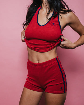 Woman wearing Bodhi Towelling Booty Short in Red