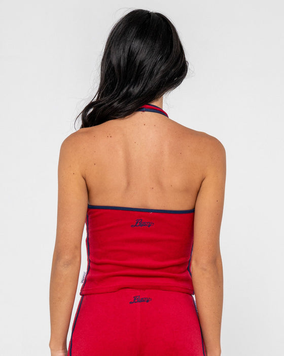 woman-wearing-bodhi-towelling-halter-neck-top-in-red