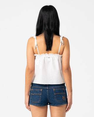 Woman wearing Feyre Cami Top in White