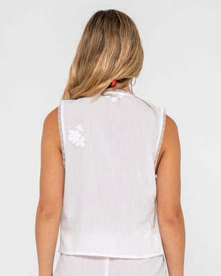 Woman wearing Feyre Tie Front Top in White