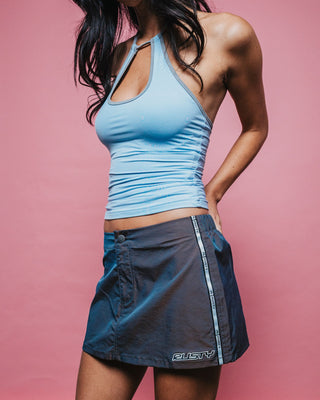 Woman wearing Lombardi Nylon Mini Skirt in Olive