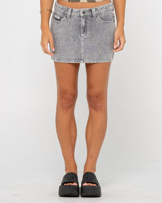 Woman wearing Mavericks Low Rise Denim Mini Skirt in London Summer