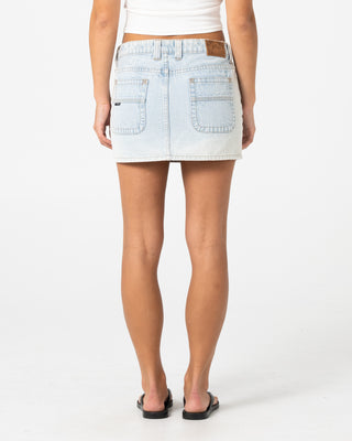 Woman wearing Mavericks Low Rise Denim Mini Skirt in Sky Blue Heather