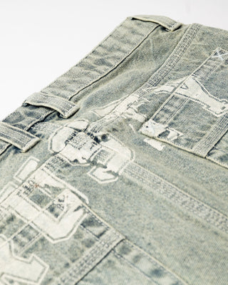 Woman wearing Norty Low Rise Denim Micro Mini Skirt in Dirty Dawg