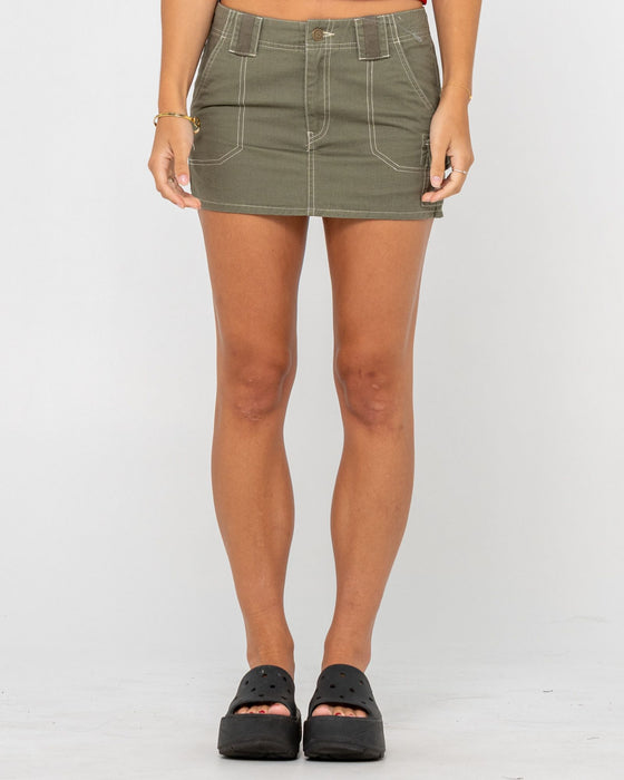woman-wearing-dirtbag-cargo-low-rise-mini-skirt-in-light-khaki