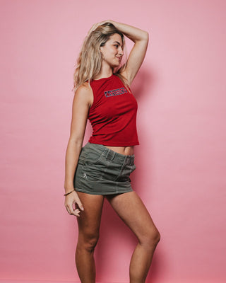 Woman wearing Dirtbag Cargo Low Rise Mini Skirt in Light Khaki