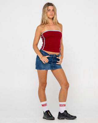 Woman wearing Shorty Low Rise Denim Micro Mini Skirt in Blasted Deep Sea Blue