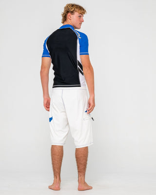 Man wearing Spitfire Short Sleeve Surf Top in Black 1