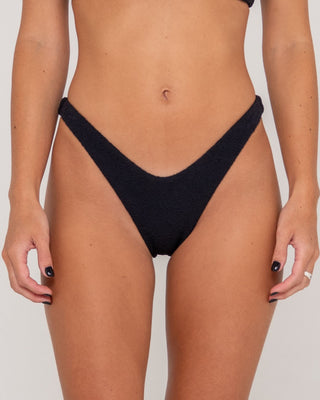 Woman wearing Sandalwood Midi Bikini Bottom in Black