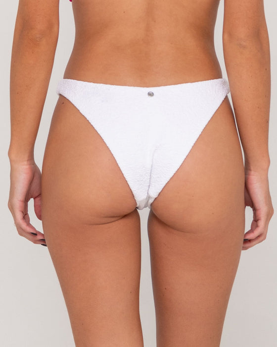 woman-wearing-sandalwood-midi-bikini-bottom-in-bright-white