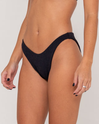 Woman wearing Sandalwood Classic Bikini Bottom in Black