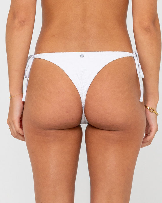 woman-wearing-sandalwood-brazilian-ties-bikini-bottom-in-bright-white