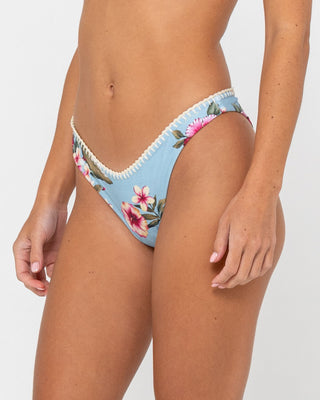 Woman wearing Kehlani Midi Bikini Bottom in Kehlani Print