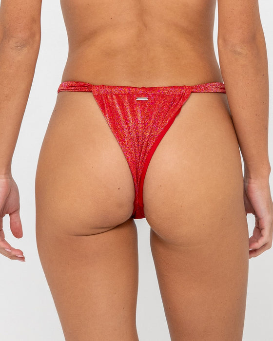 woman-wearing-shimmy-string-bikini-bottom-in-red