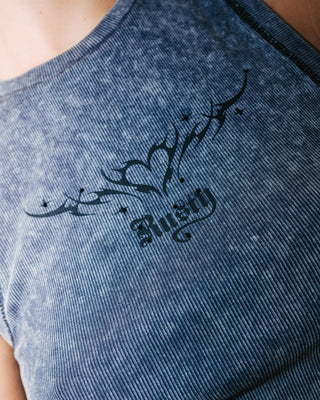 Woman wearing Mortys Fitted Tank in Acid Steel