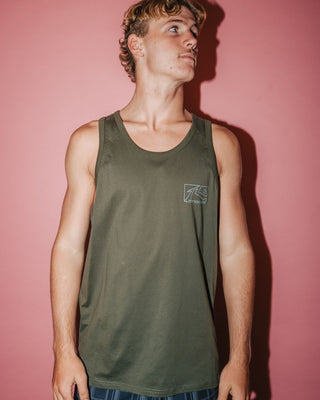 Man wearing Boxed Out Tank in Savanna