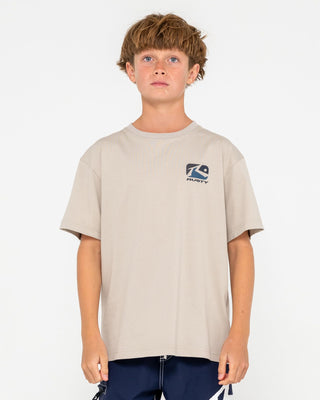 Boy wearing Phenom Short Sleeve Tee Boys in Abbey Stone
