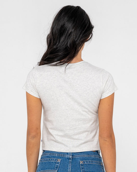 woman-wearing-rusty-essentials-relaxed-mini-tee-in-ice-marle