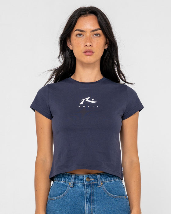 woman-wearing-rusty-essentials-relaxed-mini-tee-in-navy-blue
