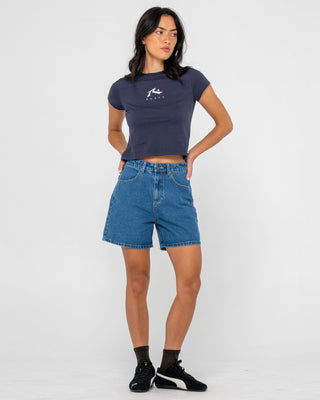 Woman wearing Rusty Essentials Relaxed Mini Tee in Navy Blue