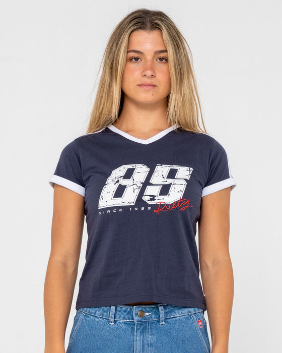 woman-wearing-le-sports-jersey-baby-tee-in-navy