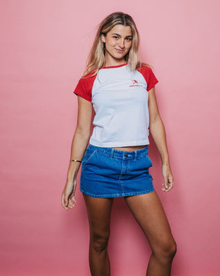 Woman wearing Devil Raglan Cap Sleeve Baby Tee in White