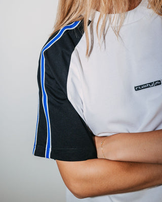 Woman wearing Crank Panelled Oversize Tee in Egret