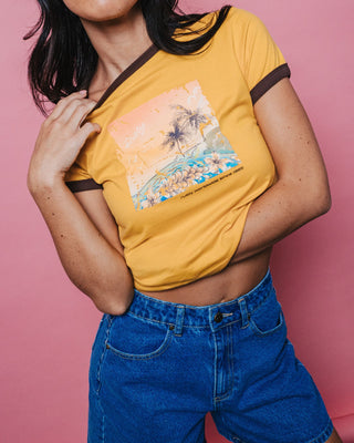 Woman wearing La Cabana Contrast Ringer Mini Tee in Lemon Yellow