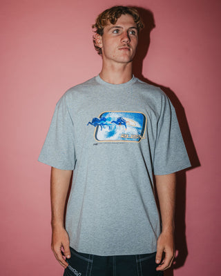 Man wearing Tidal Kombat Short Sleeve Tee in Grey Marle