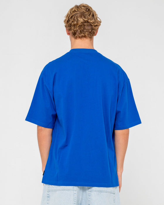 man-wearing-flip-daddy-short-sleeve-tee-in-royal-blue