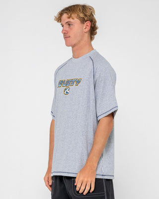 Man wearing Guido Raglan Short Sleeve Tee in Grey Marle