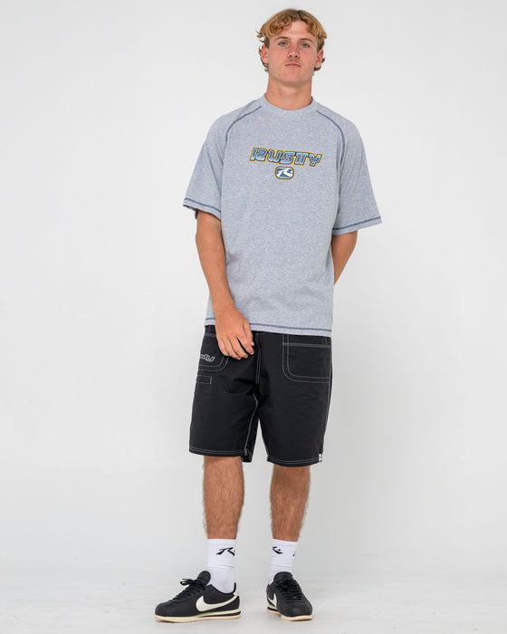 man-wearing-guido-raglan-short-sleeve-tee-in-grey-marle