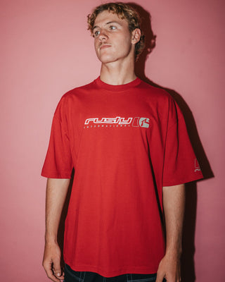 Man wearing Jetsetter Short Sleeve Tee in Vintage Red