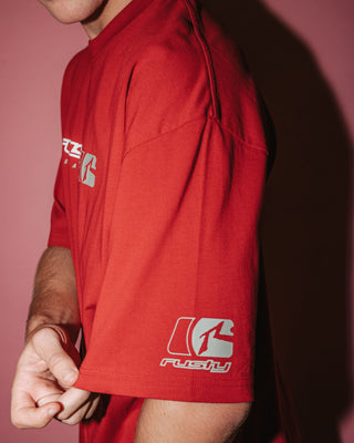 Man wearing Jetsetter Short Sleeve Tee in Vintage Red