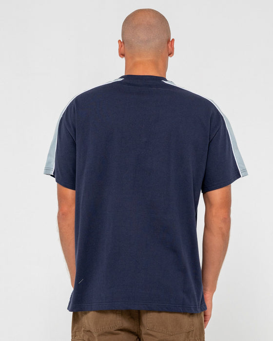 man-wearing-alonso-short-sleeve-tee-in-navy-blue-2