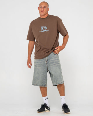Man wearing Double Or Nothin Short Sleeve Tee in Pinecone