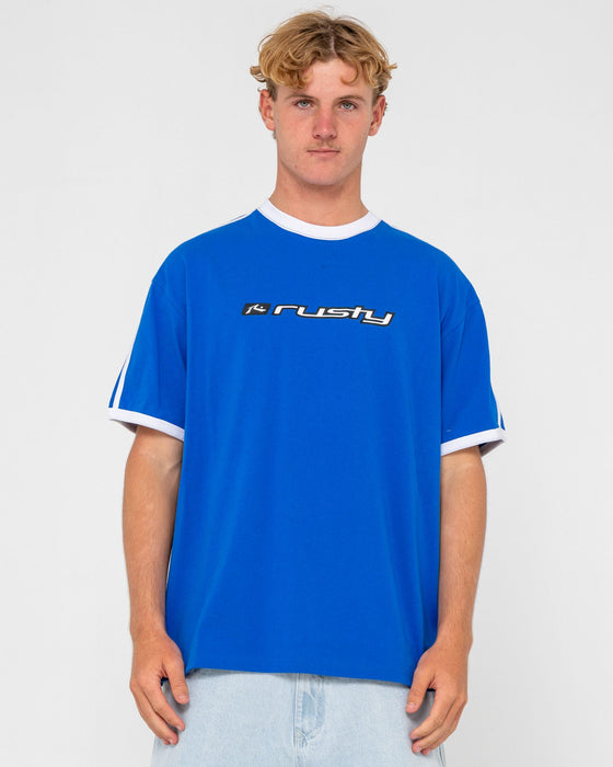 man-wearing-bright-ringer-short-sleeve-tee-in-royal-blue