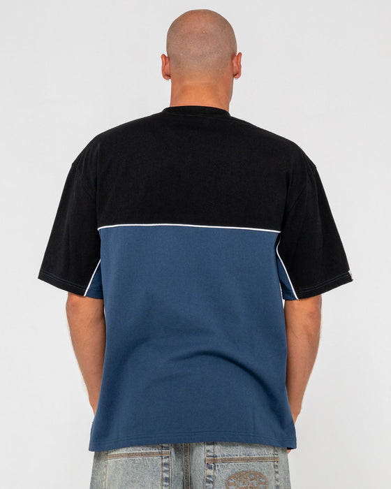 man-wearing-infinity-short-sleeve-tee-in-china-blue
