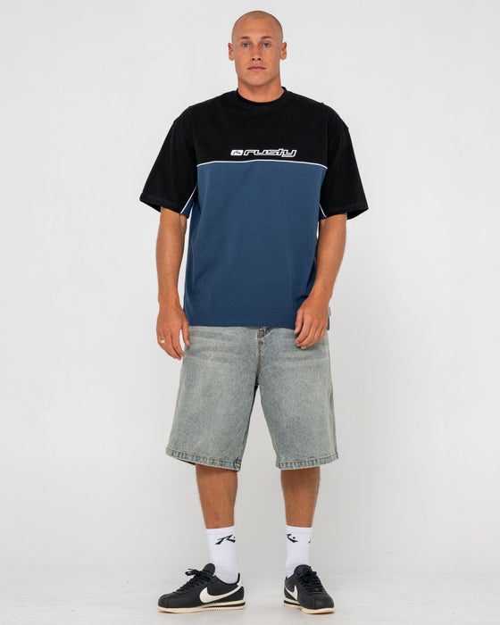 man-wearing-infinity-short-sleeve-tee-in-china-blue