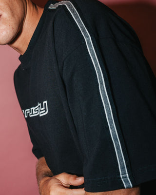 Man wearing Gaffa Taped Short Sleeve Tee in Black